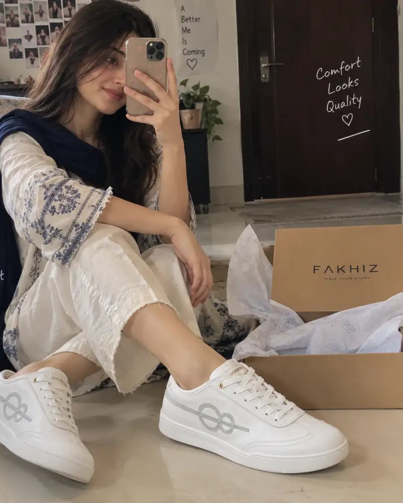 Customer wearing the FAKHIZ sneaker in white