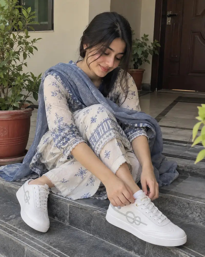 Customer wearing the FAKHIZ sneaker in white