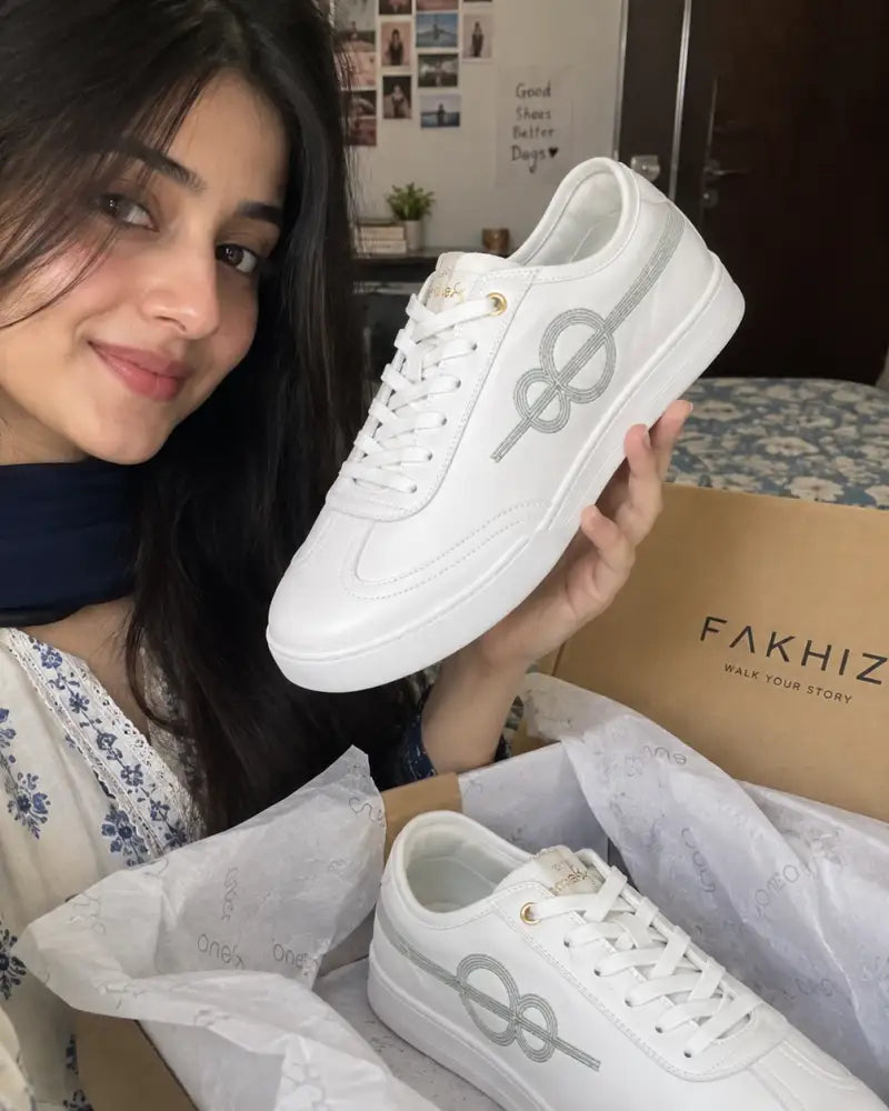 Customer wearing the FAKHIZ sneaker in white