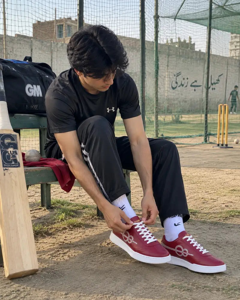Customer wearing the FAKHIZ sneaker in red